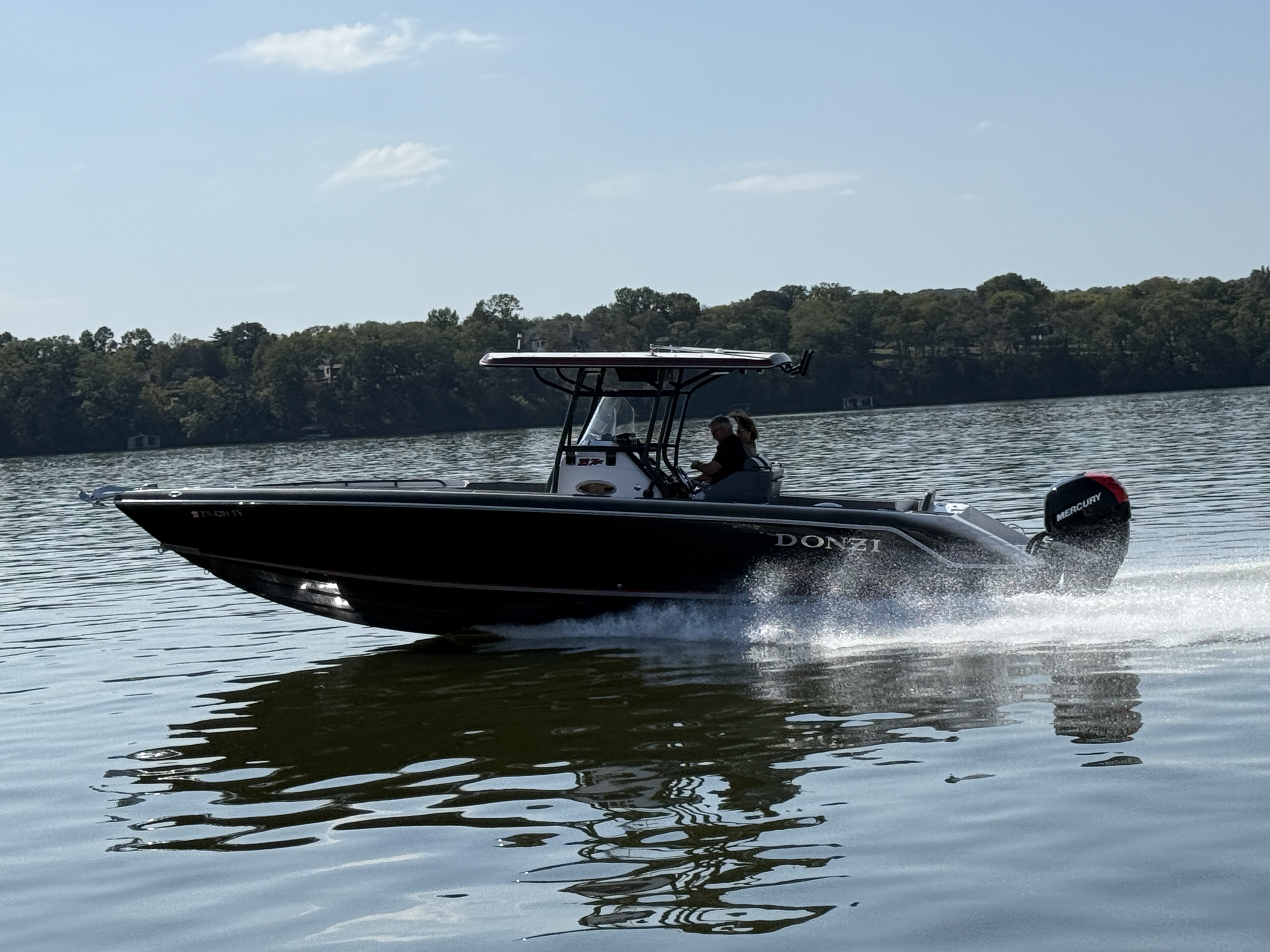 Donzi 35 ZX cruising at speed on the lake