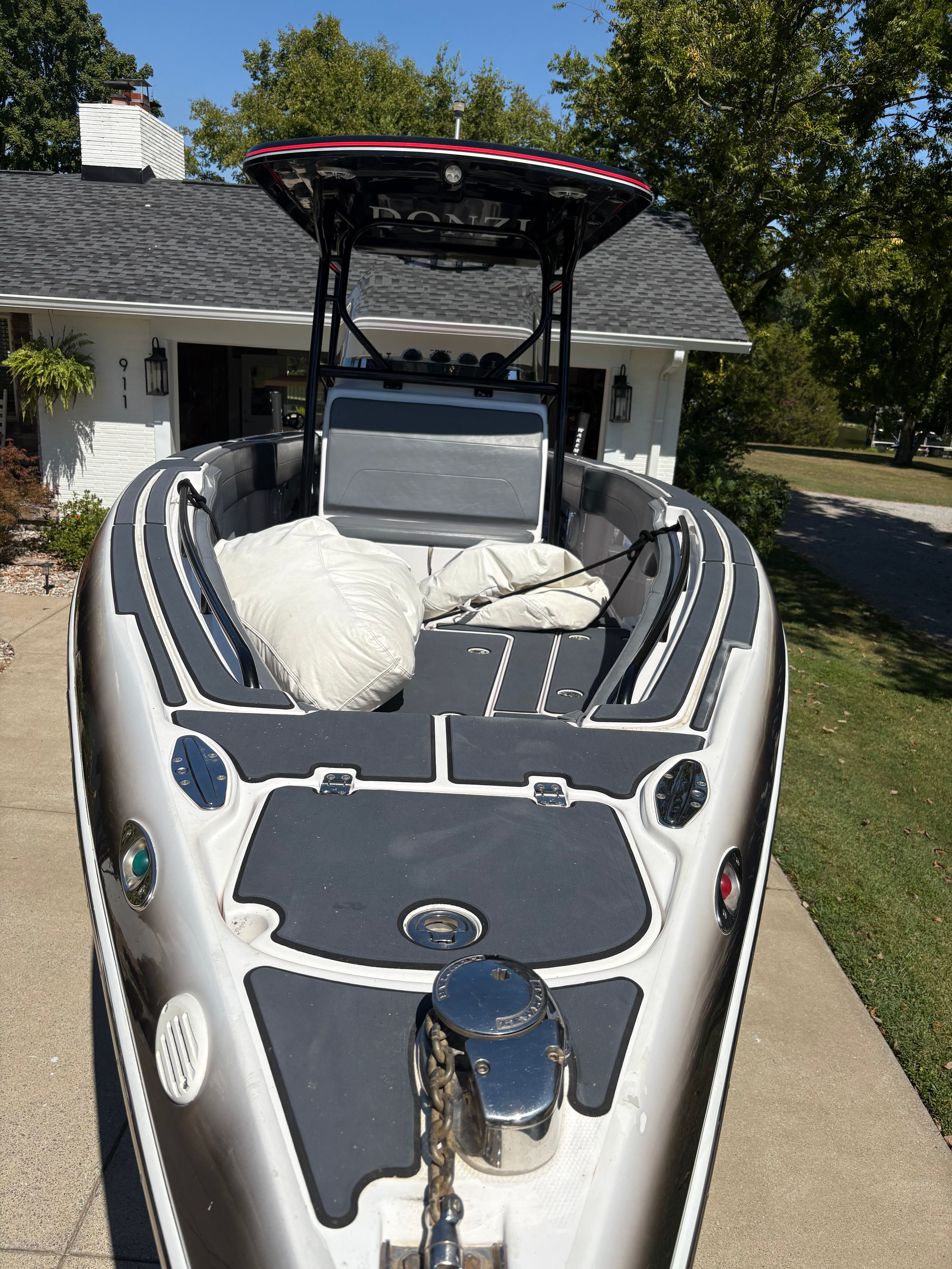 Forward bow area with SeaDek non-skid, anchor windlass, and navigation lights